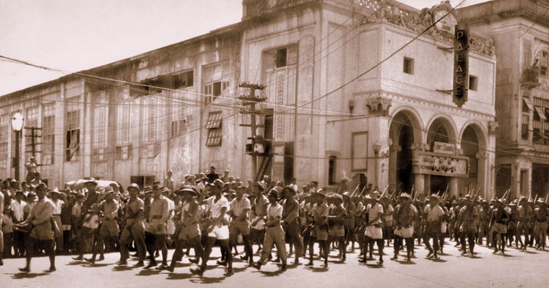 Free Panay Guerilla Forces led by Col. Macario Peralta on parade in Iloilo City Proper during Liberation of Panay, 1945.