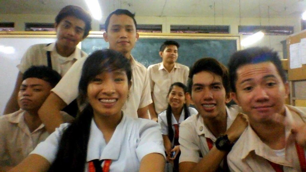 MJ Felongco with her classmates at the University of San Agustin during her college years.
