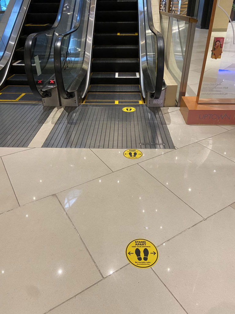 Social distancing markers are placed in escalators and ATM terminals to ensure that mall-goers will be able to observe strict procedures against the spread of COVID-19.