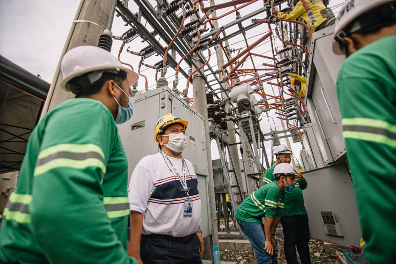 Castro overseeing the preventive maintainance of MORE Power substation.