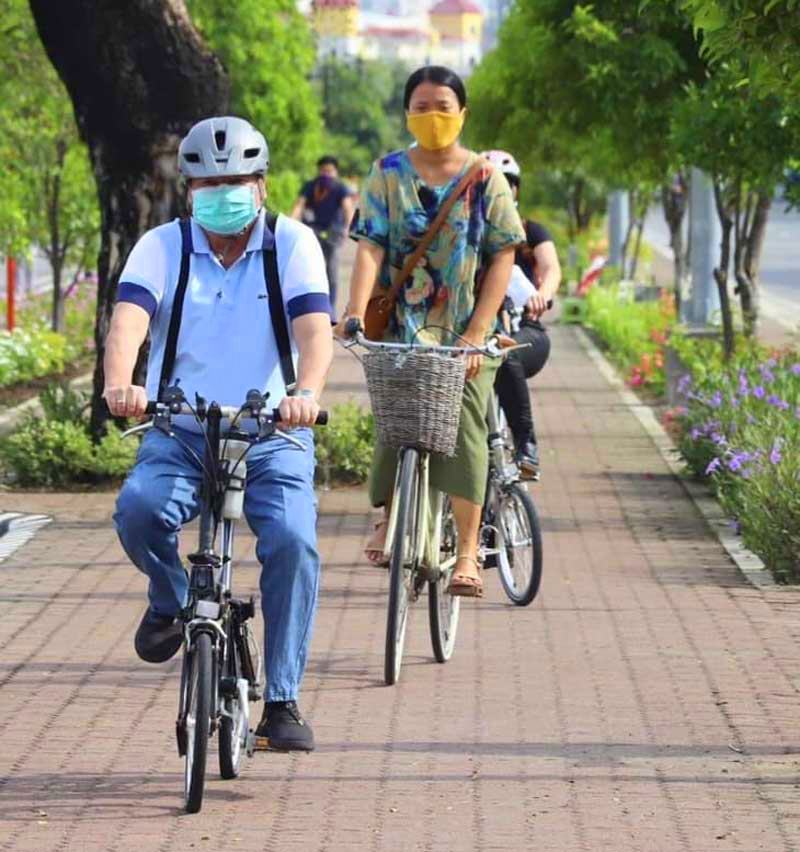 Iloilo City Mayor Jerry Trenas cycles on the protected bike lanes.