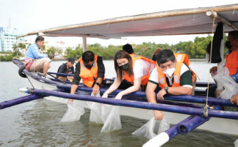 MORE Power executives releases fishes in Iloilo River.