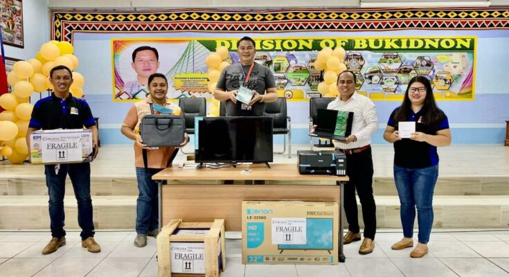 The Insular Foundation’s ICT equipment donation for Tankulan Alternative Learning System-Community Learning Center (ALS-CLC) in Manolo Fortich, Bukidnon were received by teachers and Department of Education representatives. (From left) Nicolas C. Butaya ALS Mobile Teacher; Rolly S. Ortiz. Jr., and Elbert Francisco, Education Program Specialist II; Audie S. Borres, Assistant Schools Division Superintendent, Division of Bukidnon; and Kathlea Kristine De Los Santos, District ALS Coordinator.