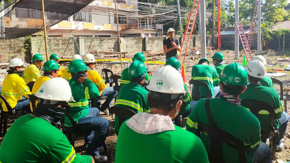 Engr. Bailey del Castillo, MORE Power Network Operation Deputy head, addresses the linemen and engineers during the retraining.