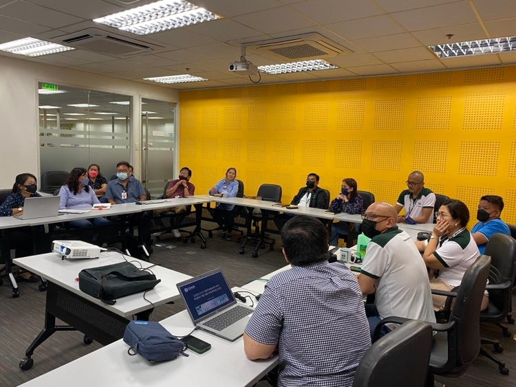 Representatives of USAID thru RTI International, the Iloilo city government, and MORE Power meet to discuss the local energy plan of Iloilo City.