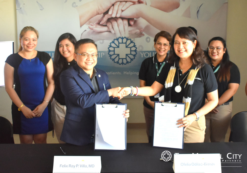 The Medical City Iloilo Chief Executive Officer Dr. Felix Ray Villa and PHINMA-University of Iloilo Chief Operating Officer Ofelia Odilao-Bisnar led the MOA Signing Event for the Clinical Nurse Residency Program