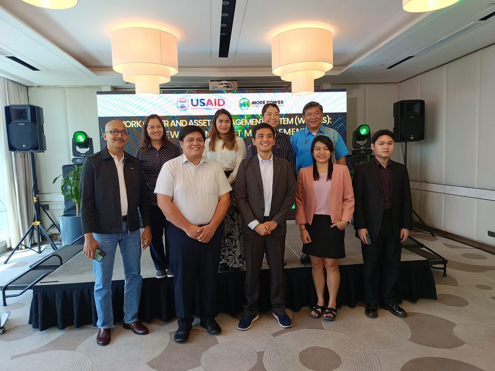 MORE Power execs Roel Castro and Bailey del Castillo with the USAID team.