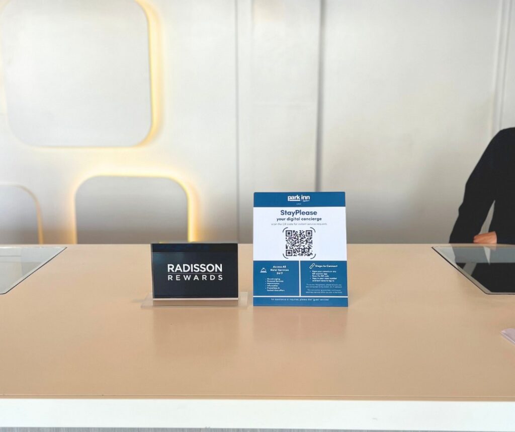 StayPlease Menu QR displayed in the Front Office of Park Inn by Radisson Iloilo