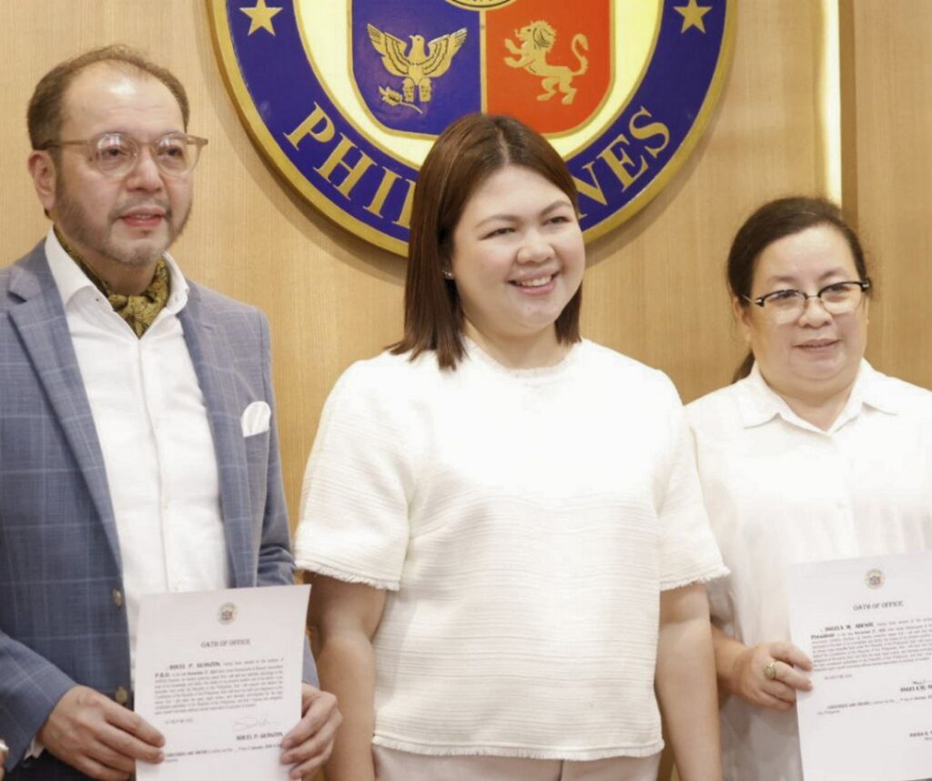 General Manager Rouel Guanzon with Raisa Treñas-Chu and Happy Abenir during the induction of officers of the Iloilo Hotel Restaurants and Resorts Association